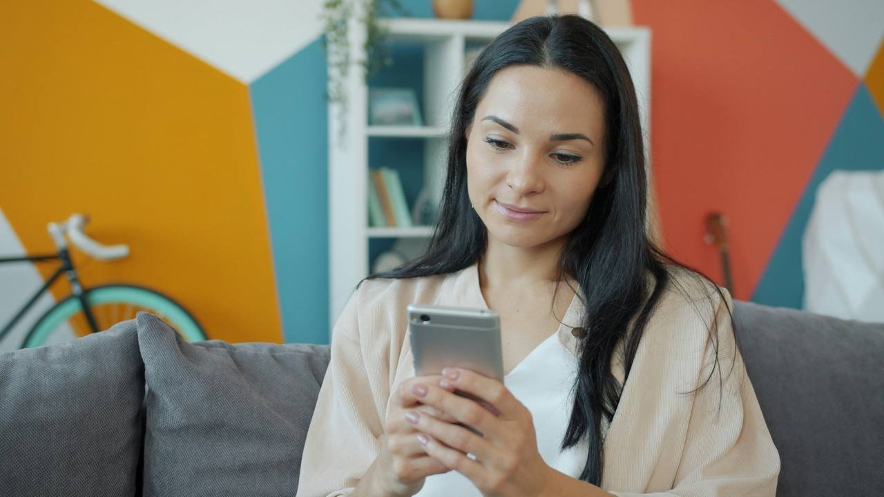 Family member checking updates on phone