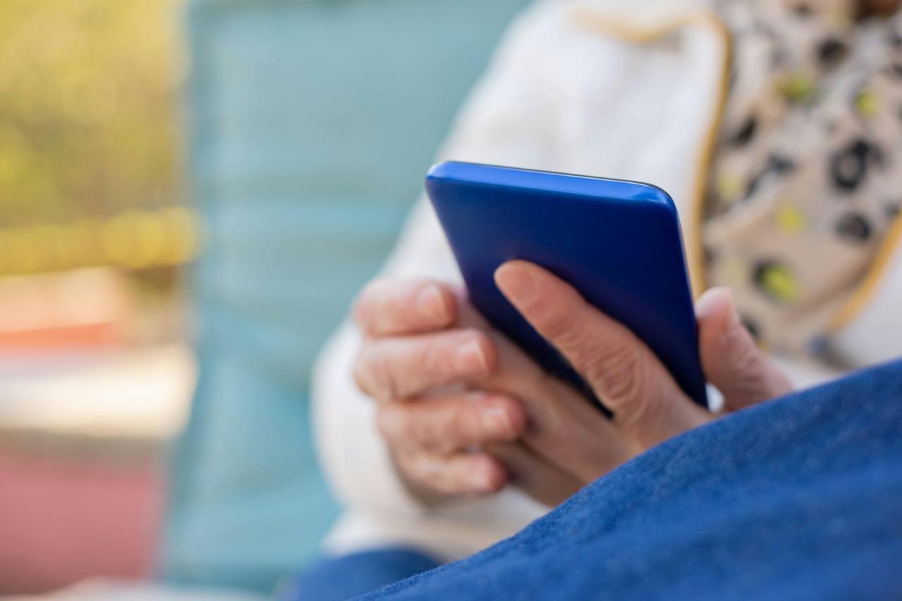 Family member staying connected via phone
